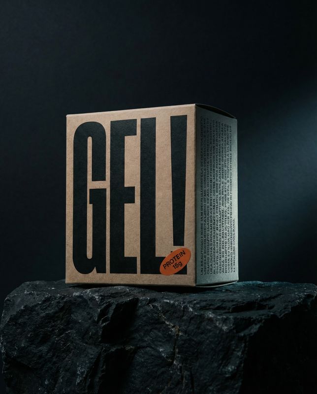 a box of gel sitting on top of a rock