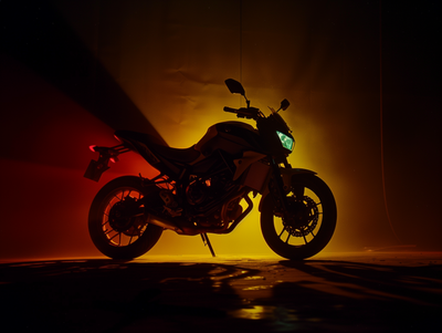 a motorcycle parked in a dimly lit area