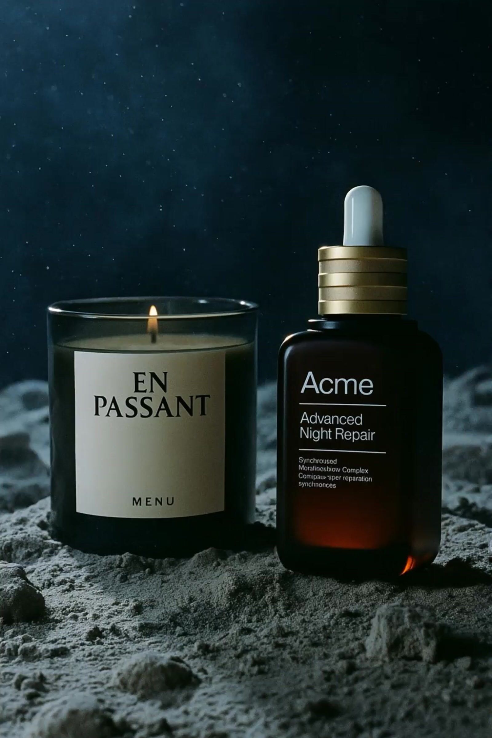 a candle and a bottle of acne on a rock