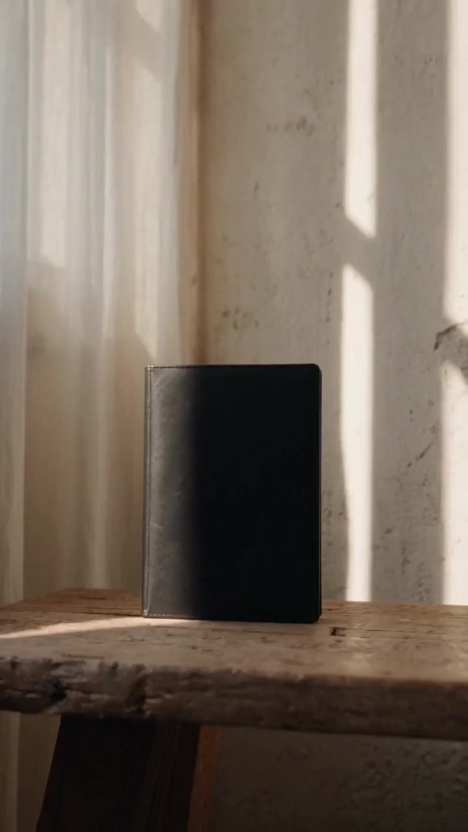 a book sitting on top of a wooden table