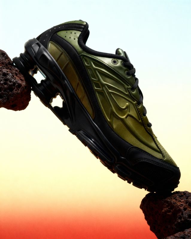 a pair of shoes that are on top of a rock