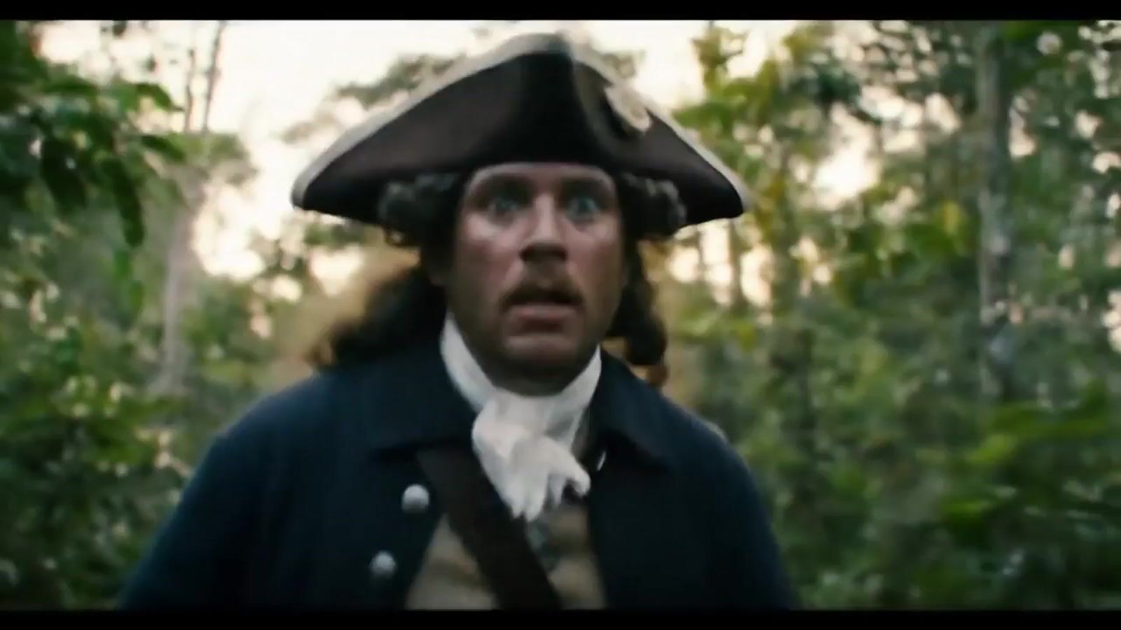 a man in a pirate costume with a surprised look on his face