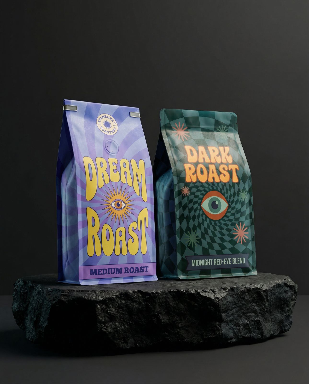 two bags of coffee sitting on top of a rock