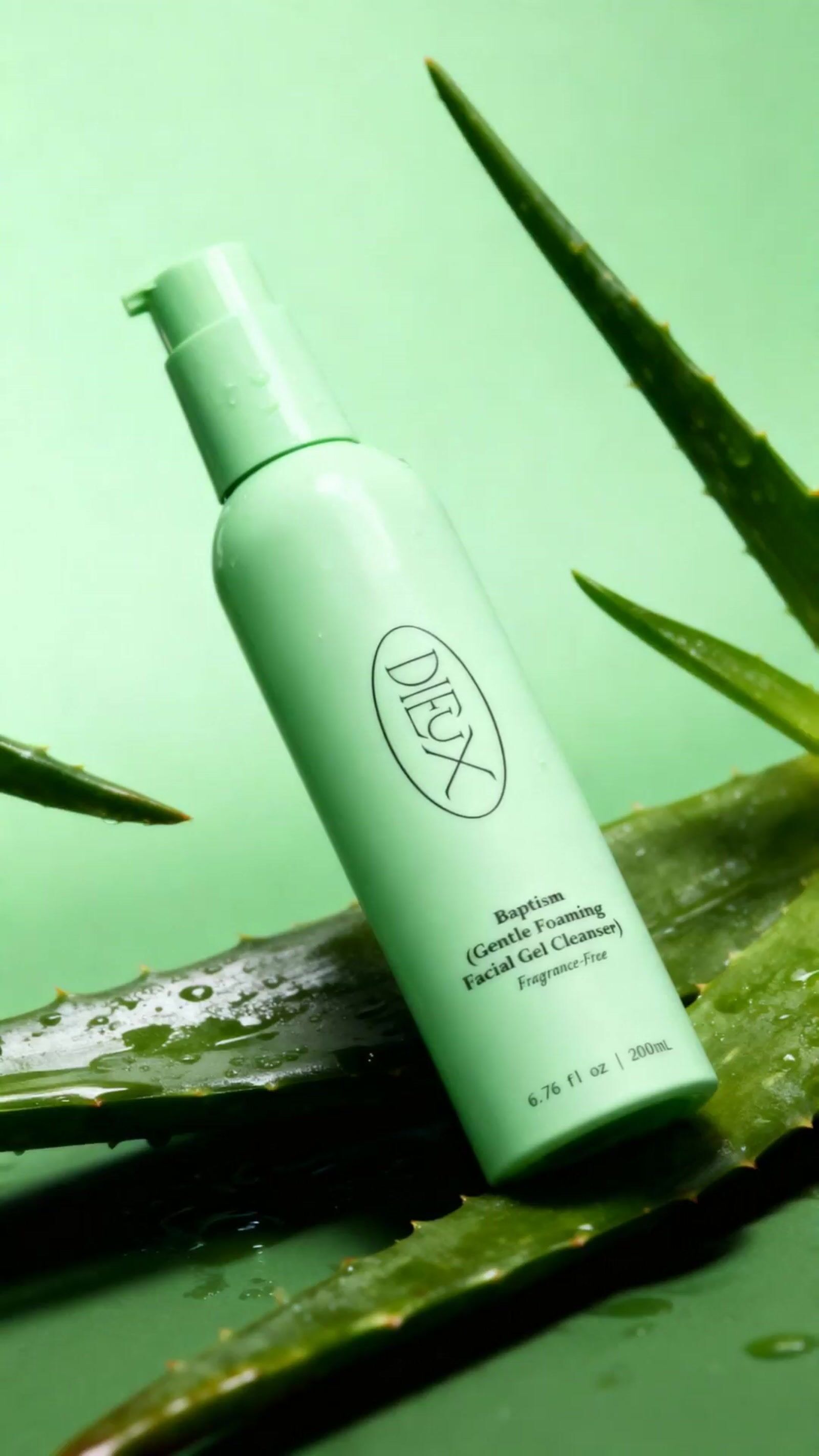 a bottle of deodorant sitting on top of a plant