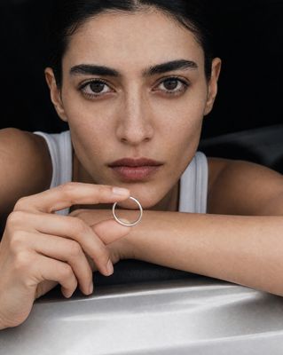 a woman with a ring on her finger