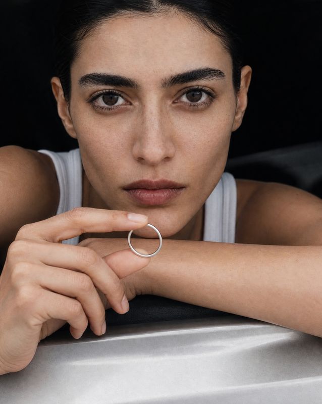 a woman with a ring on her finger