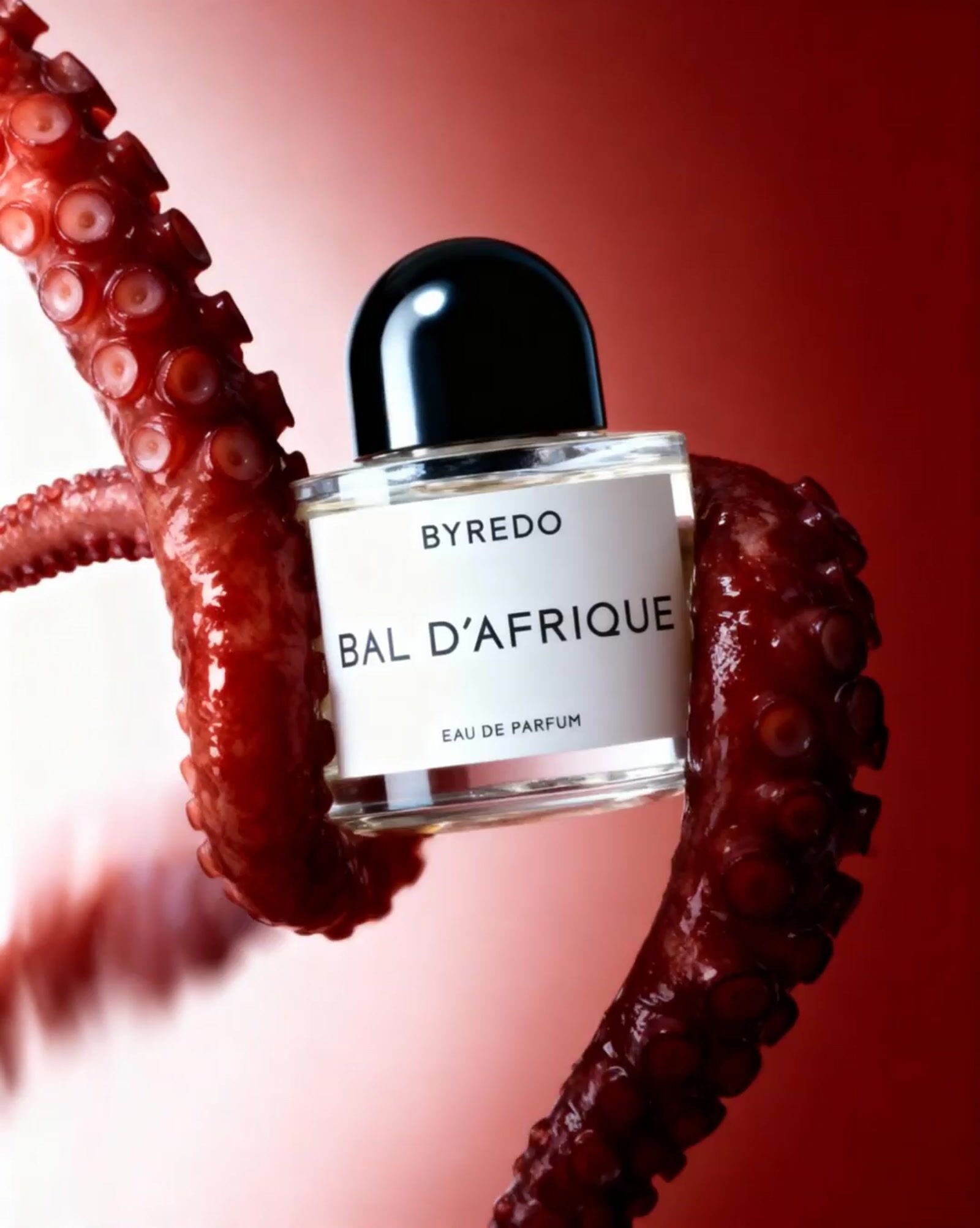 a bottle of bal d'afrique in the shape of an octopus