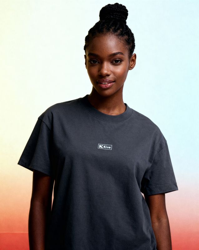 a woman standing in front of a colorful background