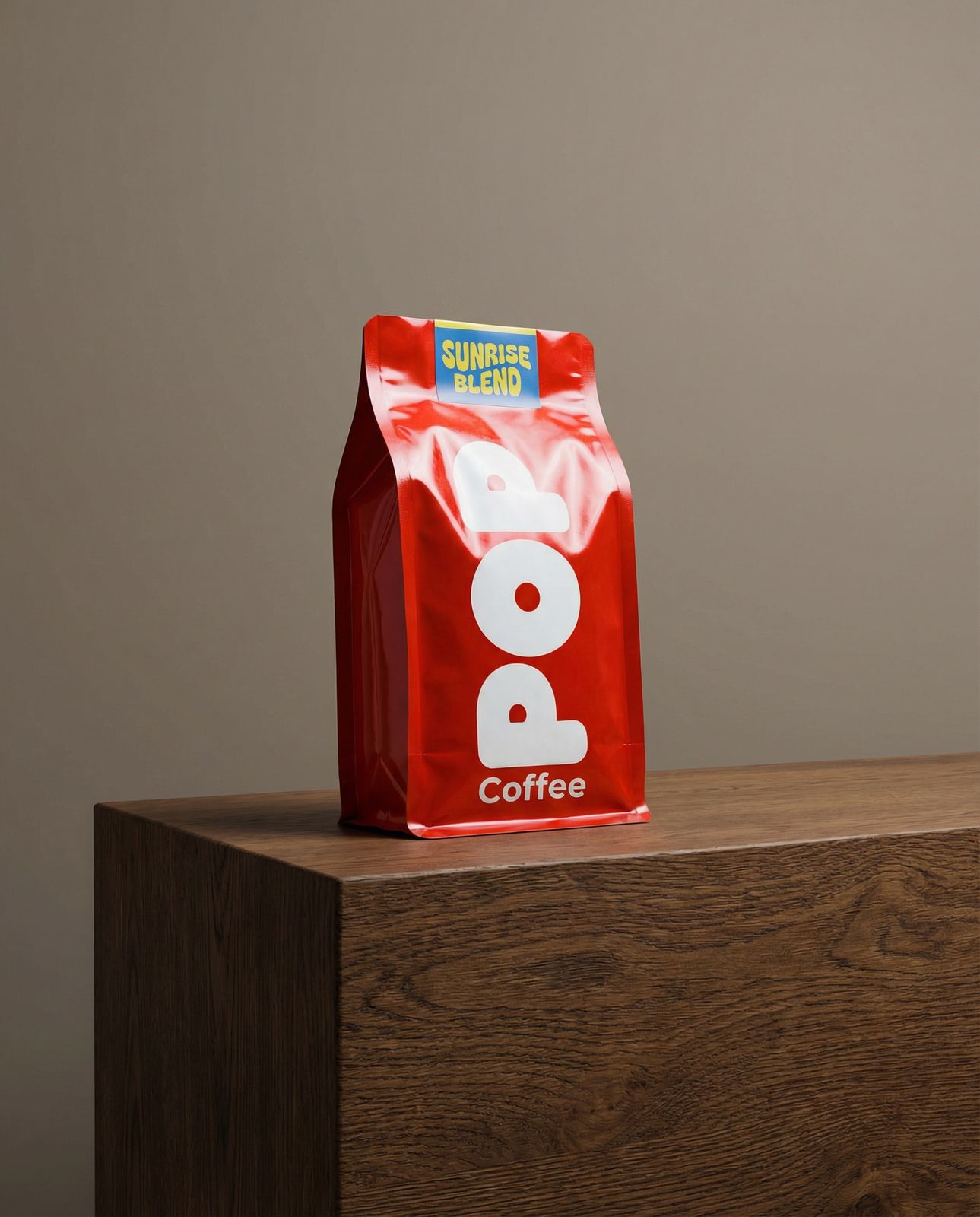 a bag of coffee sitting on top of a wooden table