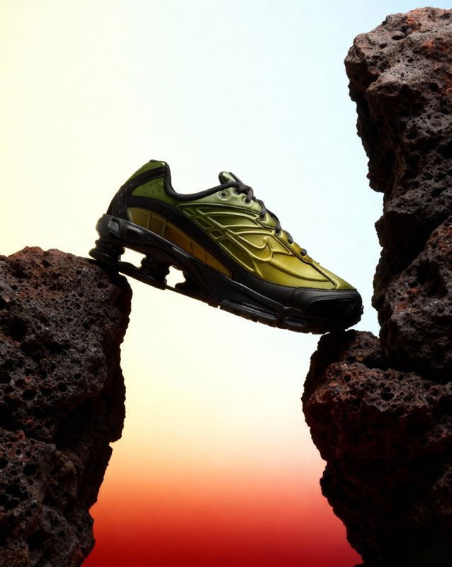 a pair of shoes that are sitting on some rocks