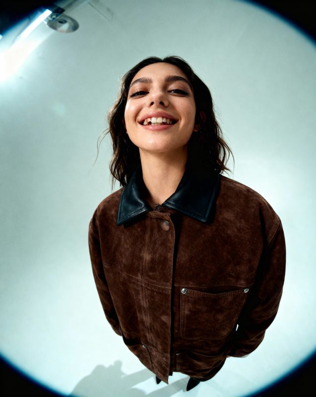 a woman with a smile on her face