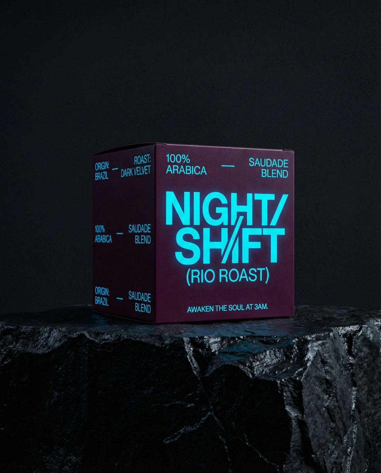 a purple box sitting on top of a rock