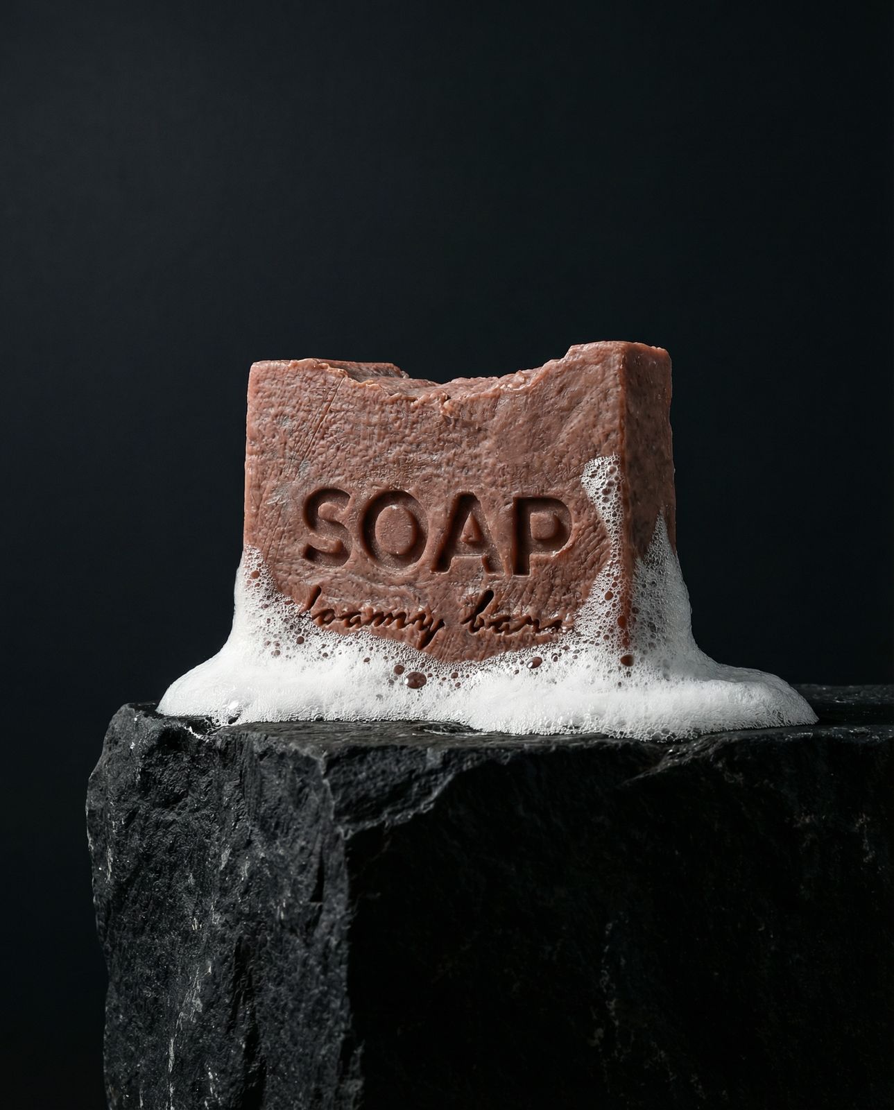 a soap bar sitting on top of a rock