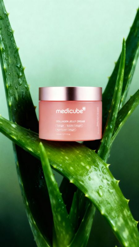 a jar of cream sitting on top of a plant