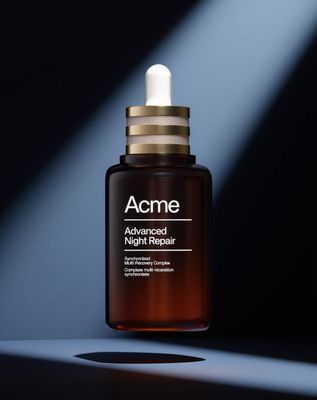 a bottle of acne advanced night repair