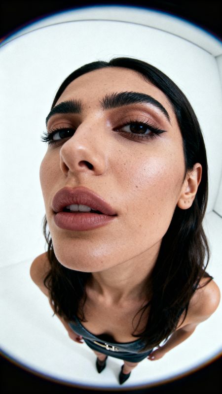 a close up of a person wearing a necklace