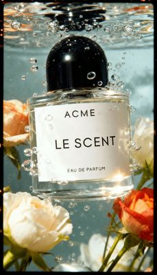 a bottle of perfume floating in the water