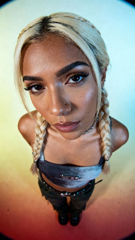 a woman with blonde hair and a braid