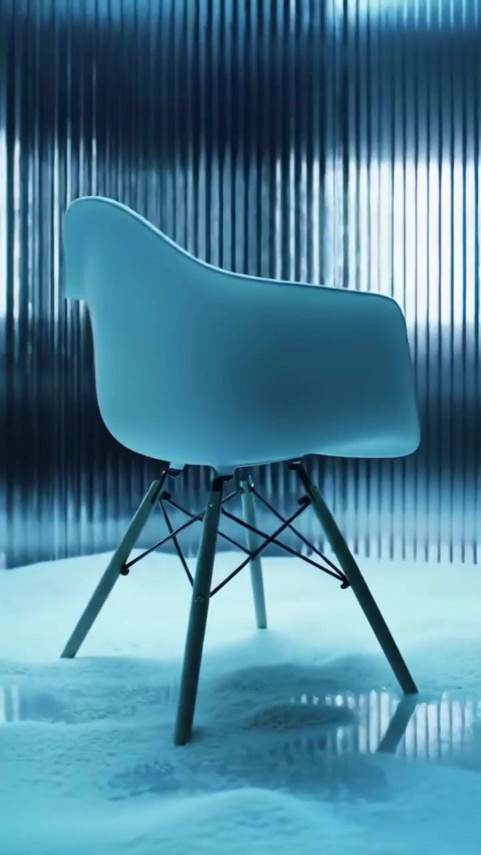 a white chair sitting on top of a white floor