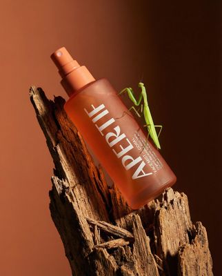 a close up of a bottle of insect repellent