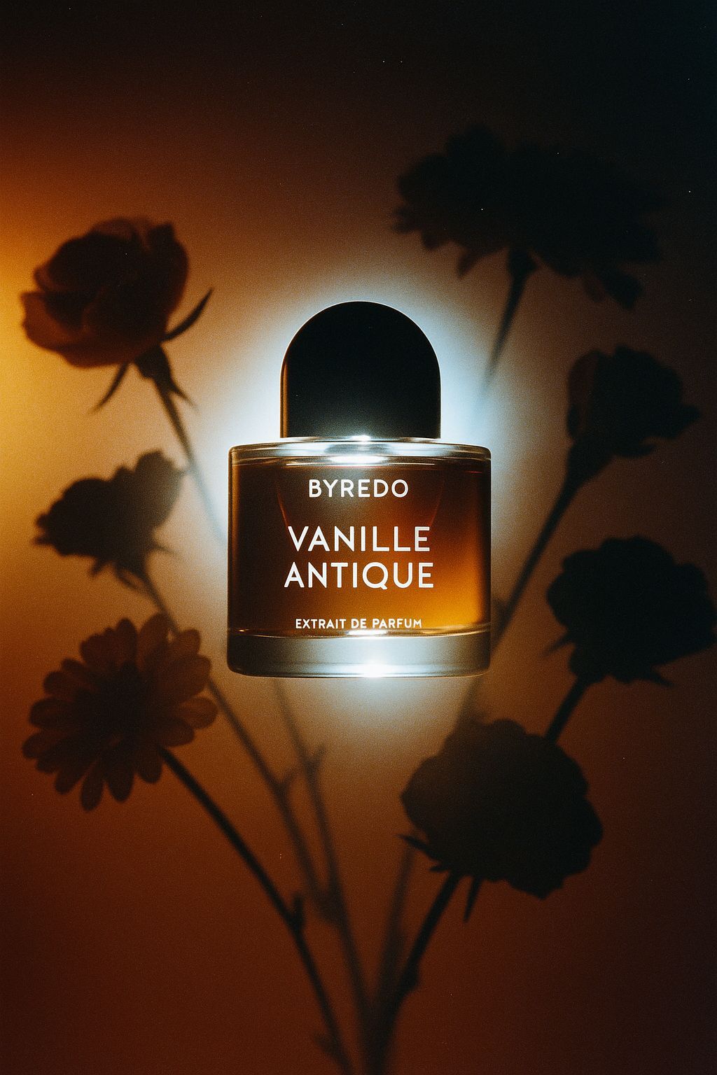 a bottle of perfume sitting on top of a table