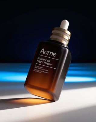 a bottle of acne advanced night repair