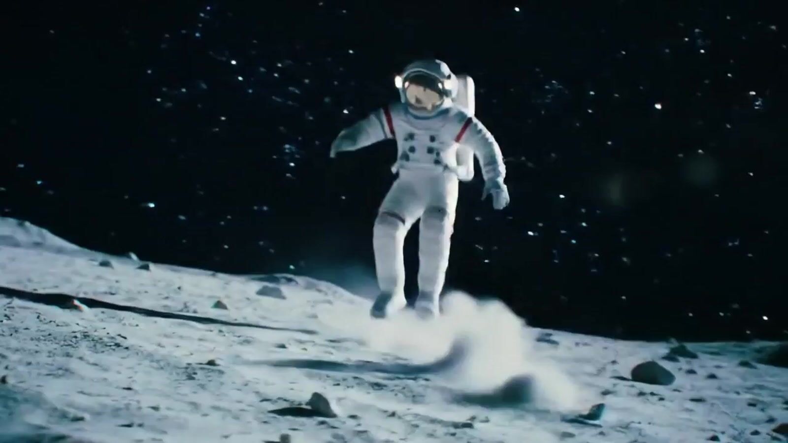 a man in a space suit standing on the moon