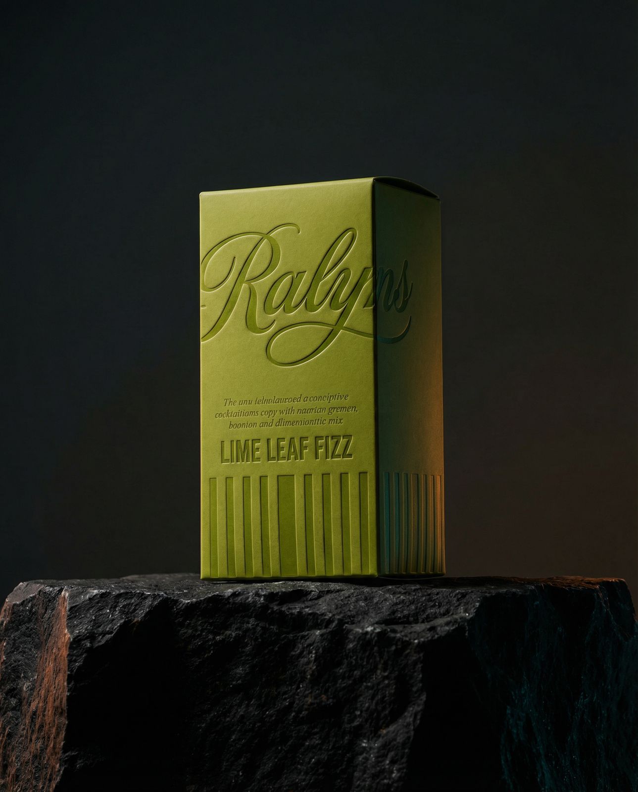 a green box sitting on top of a rock