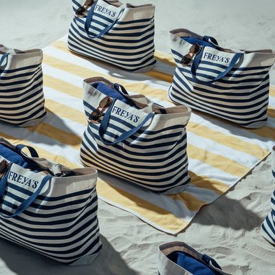 a group of bags sitting on top of a beach