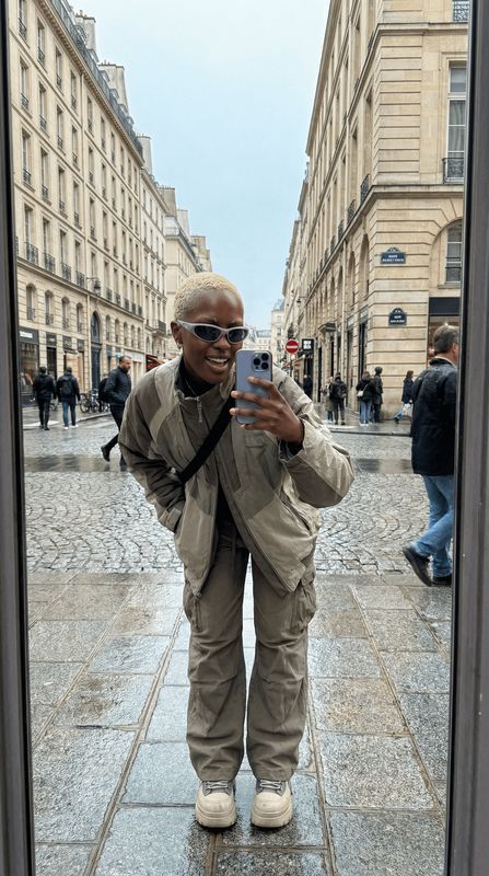 a man taking a picture of himself in a mirror