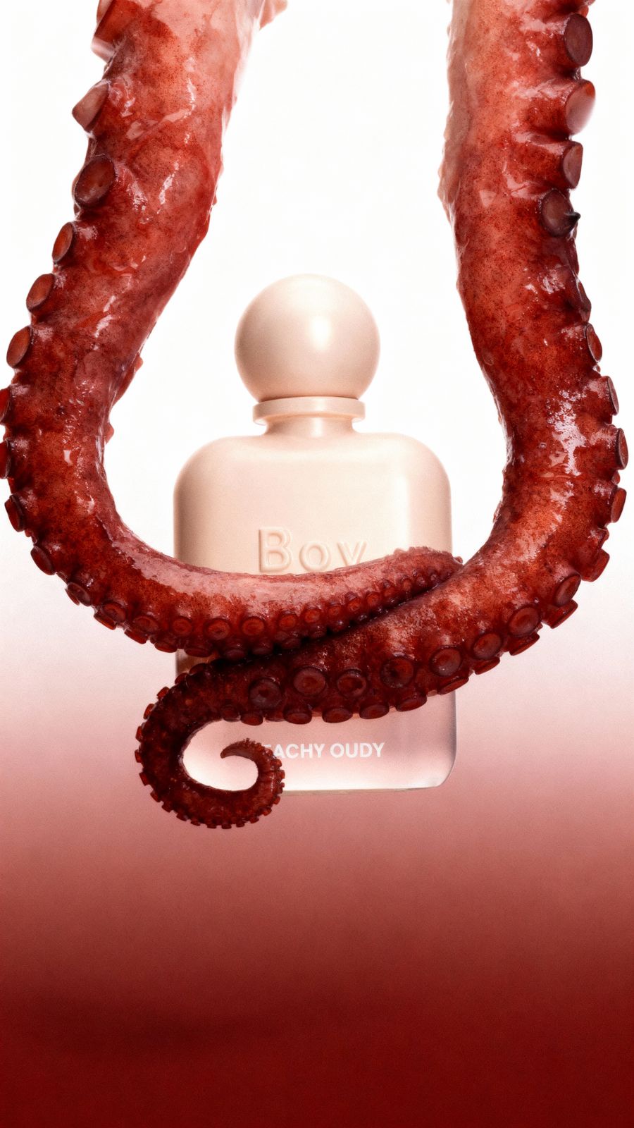 an octopus with a bottle of perfume in its mouth