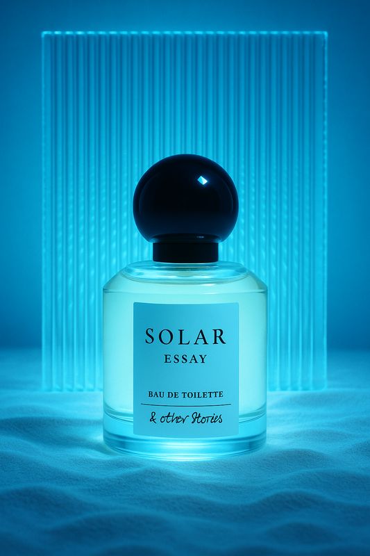 a bottle of perfume sitting on top of a table