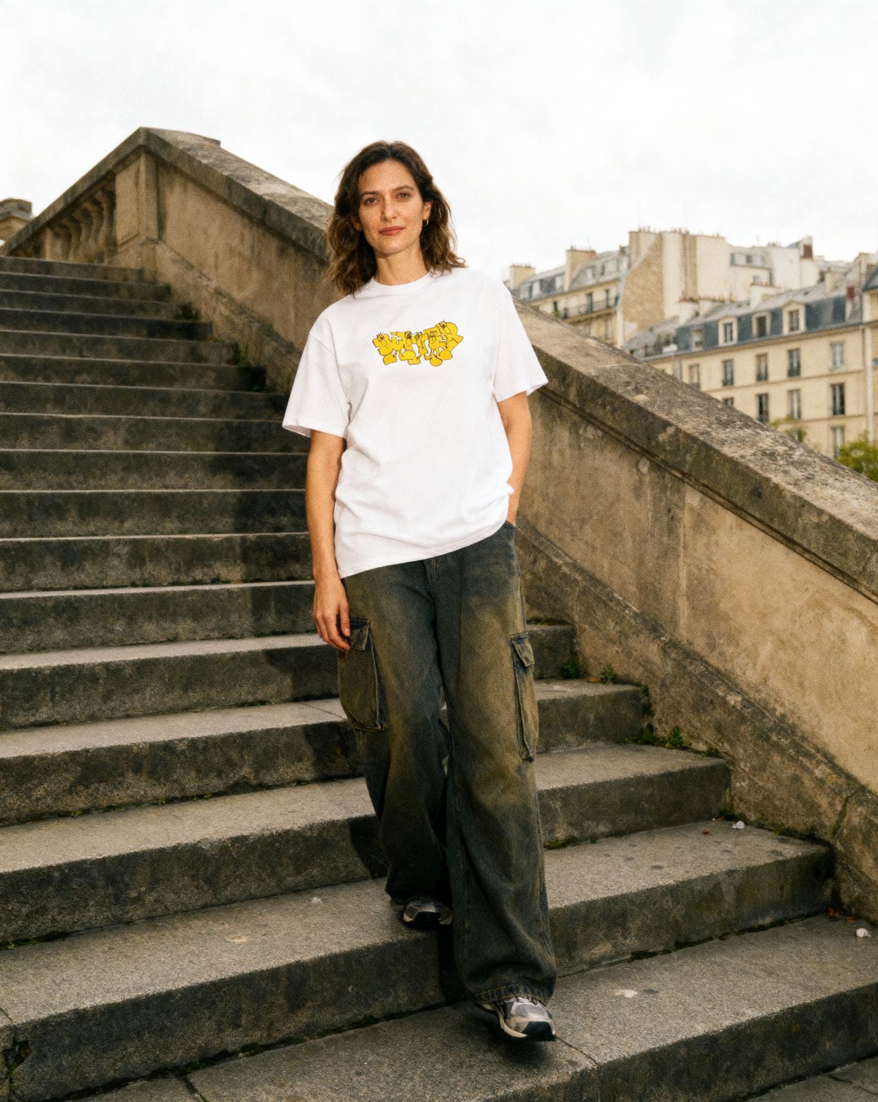 a person standing on some steps with a skateboard