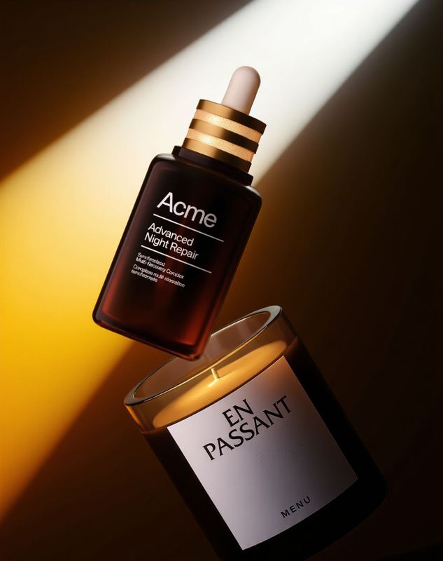 a bottle of acne and a jar of night repair