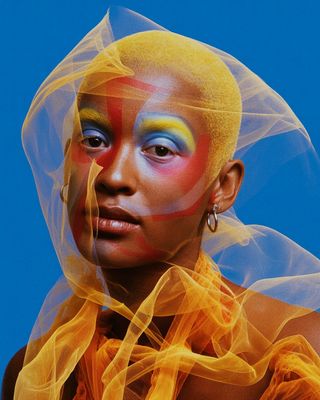 a woman with a veil over her head