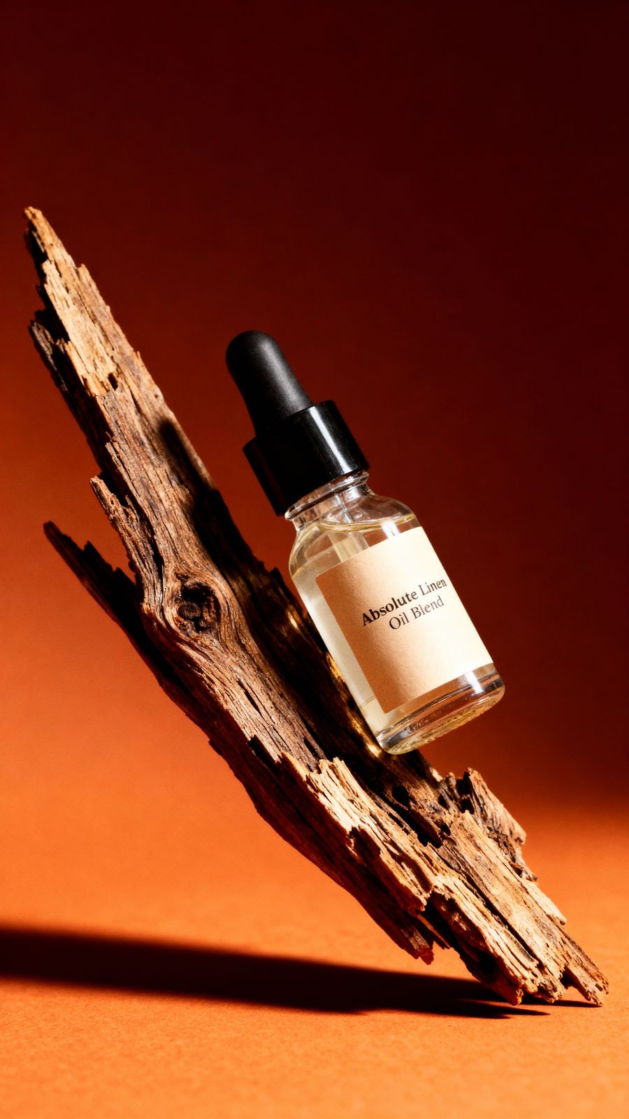 a bottle of perfume sitting on top of a piece of wood