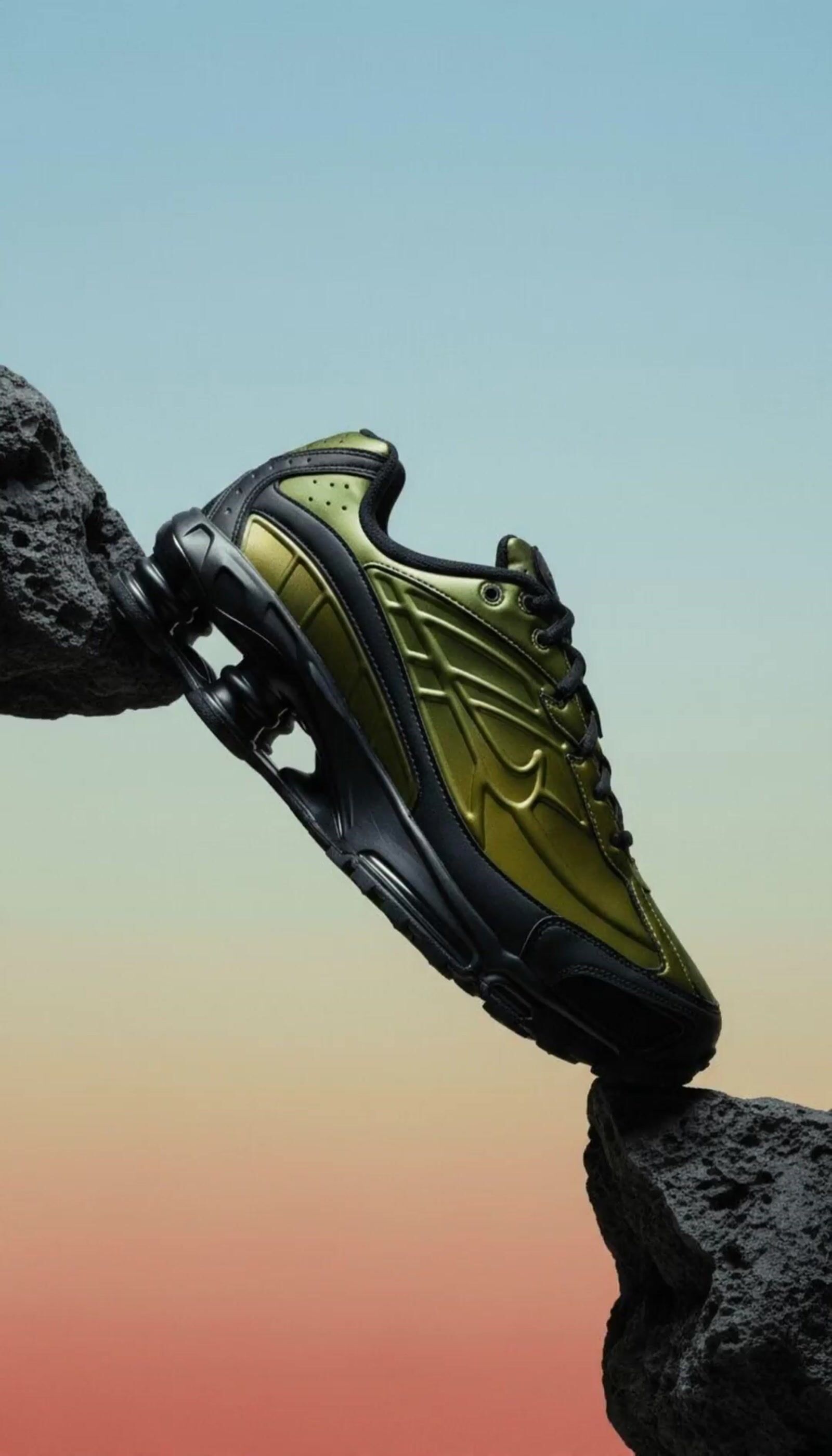 a pair of shoes on top of a rock