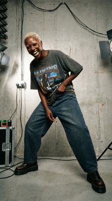 a man is posing for a picture in a studio