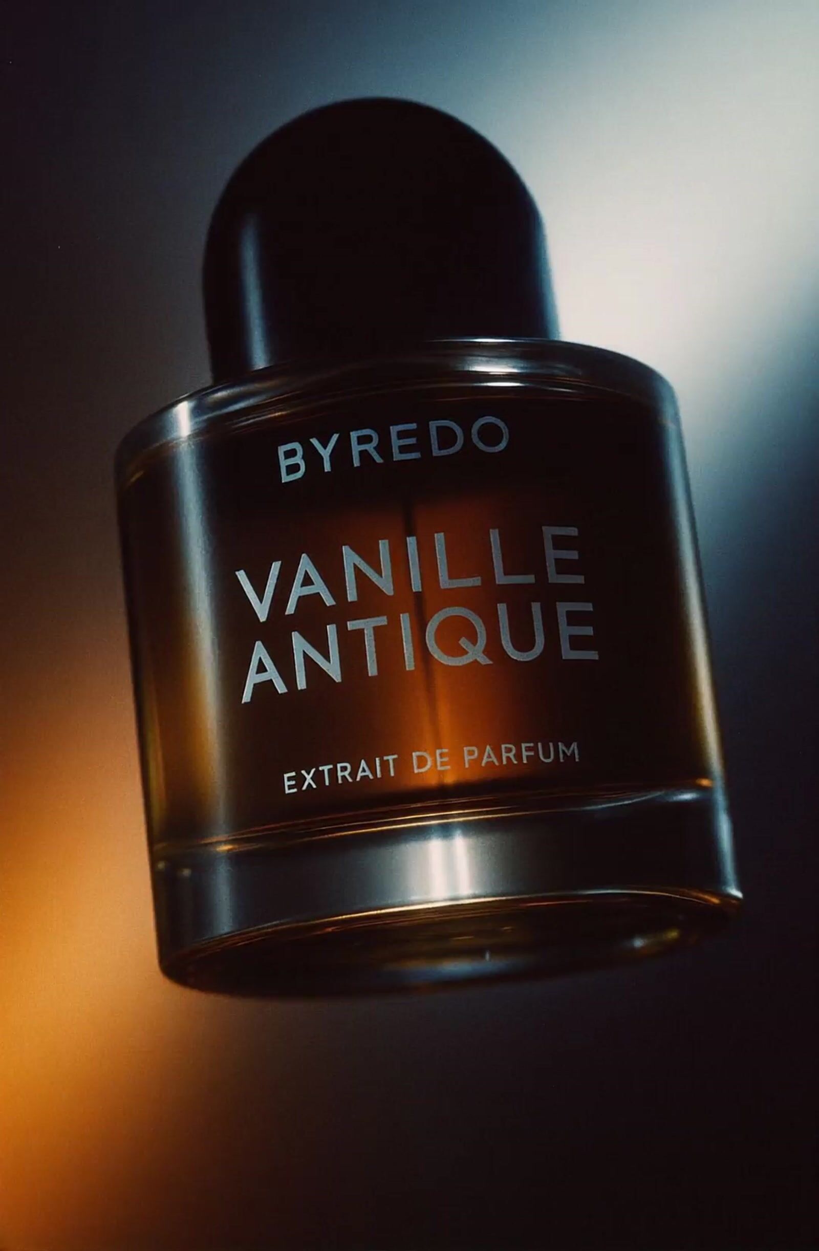 a close up of a bottle of perfume