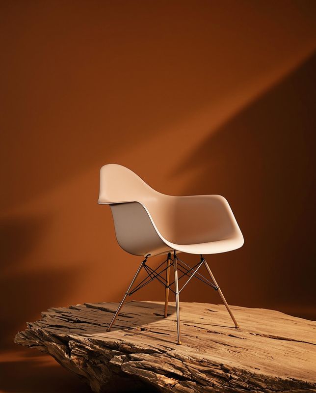 a white chair sitting on top of a wooden table