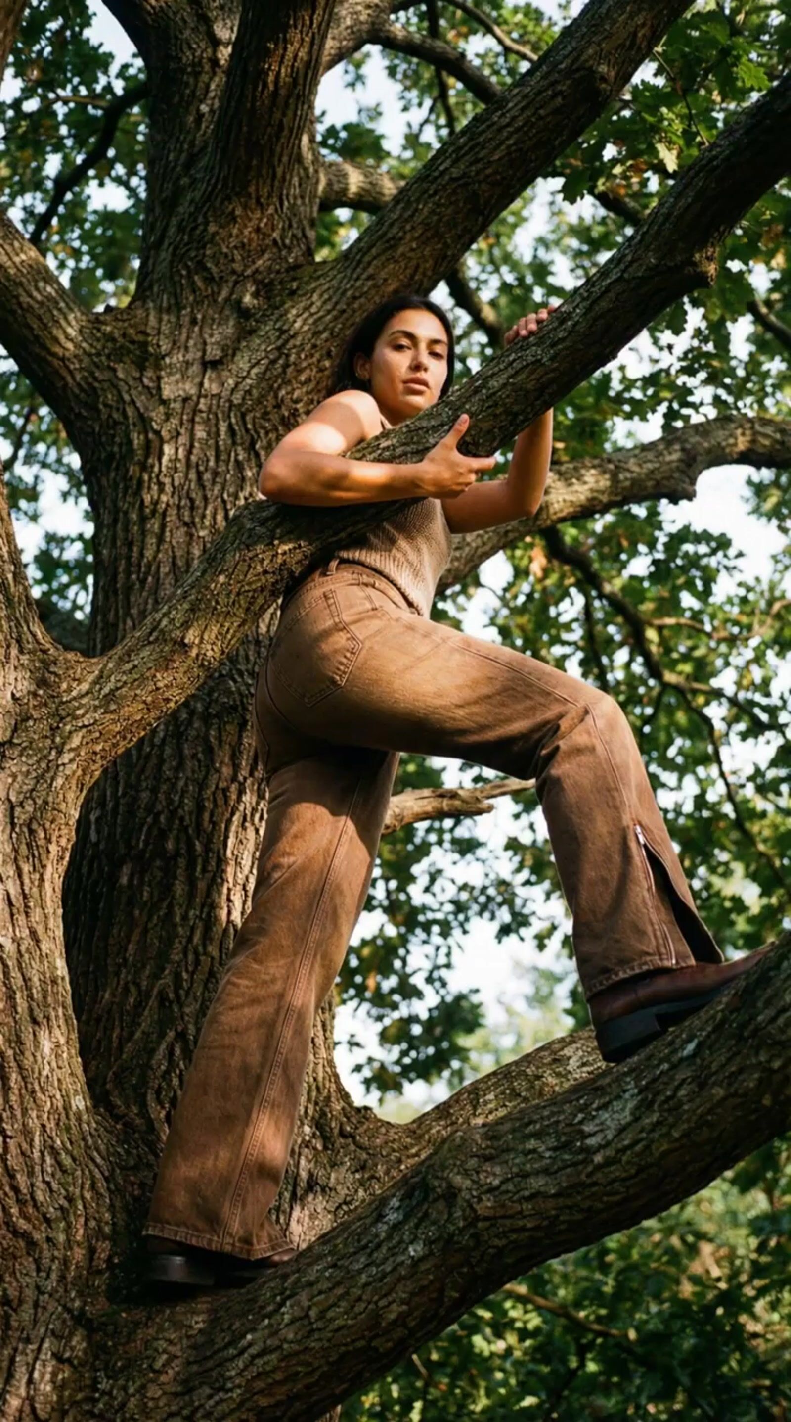 a man sitting in a tree with his arms crossed