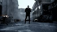 a man standing in the middle of a street