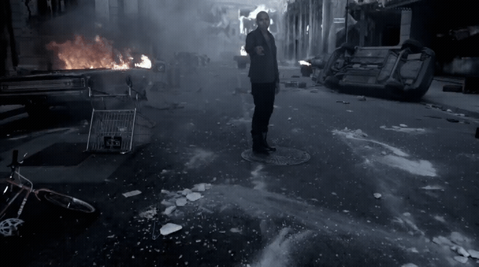 a man standing in the middle of a street