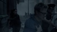 a group of people walking down a street