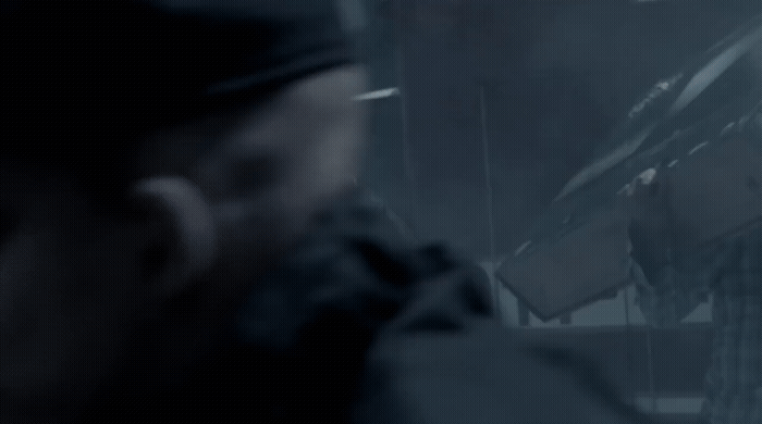 a blurry photo of a man in a baseball cap