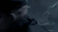 a blurry photo of a man in a baseball cap