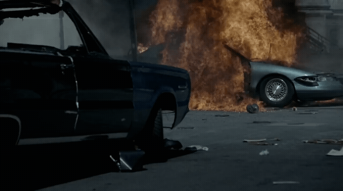 a car that is on fire in a garage