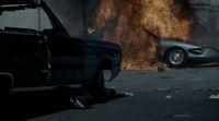 a car that is on fire in a garage