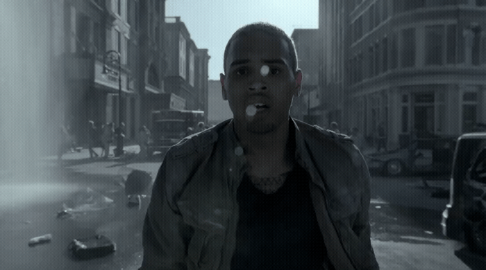a man standing in the middle of a street