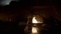 a fire burning inside of a small oven